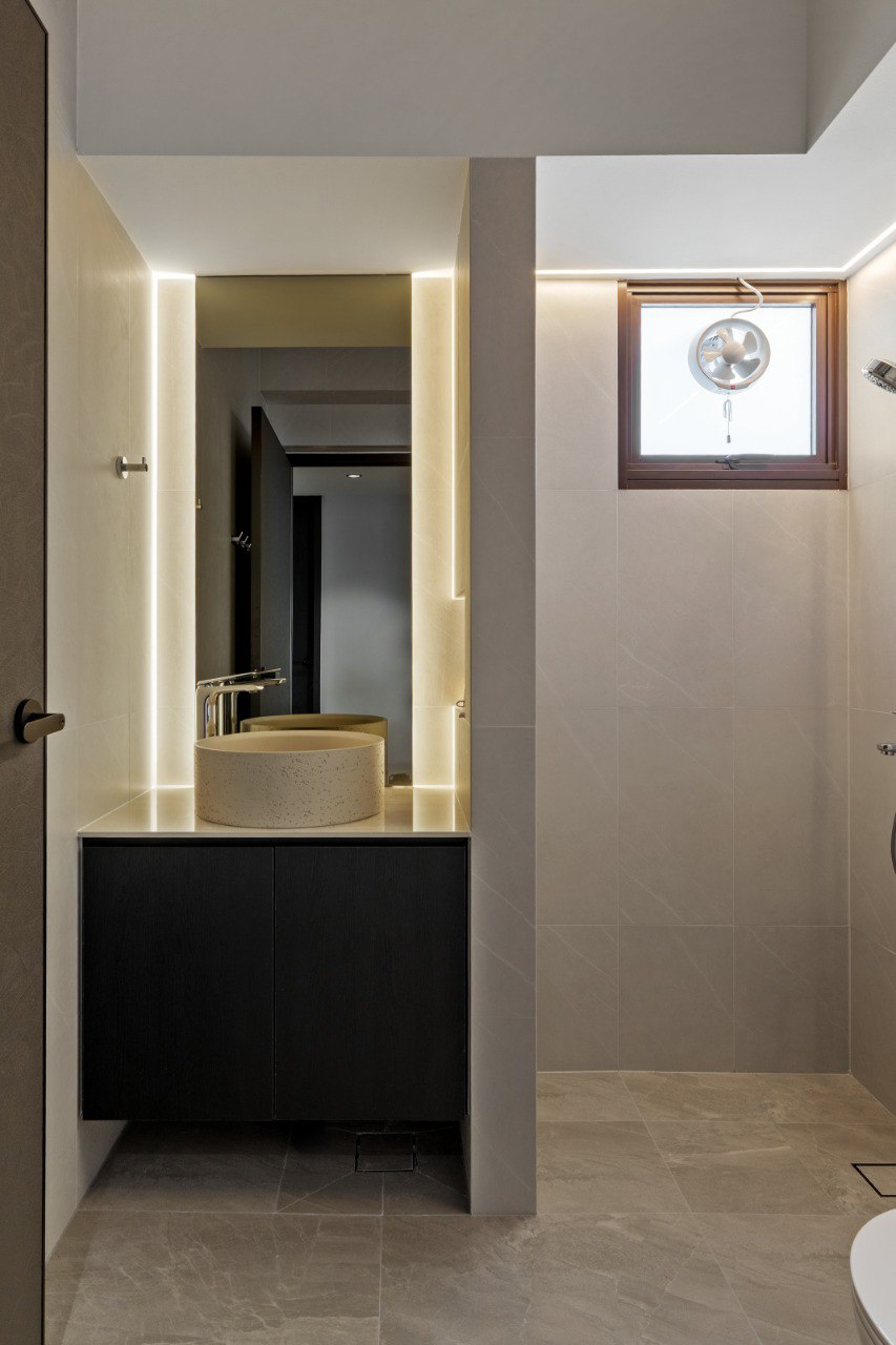Ridge in Contrast — softly illuminated bathroom entrance and vanity